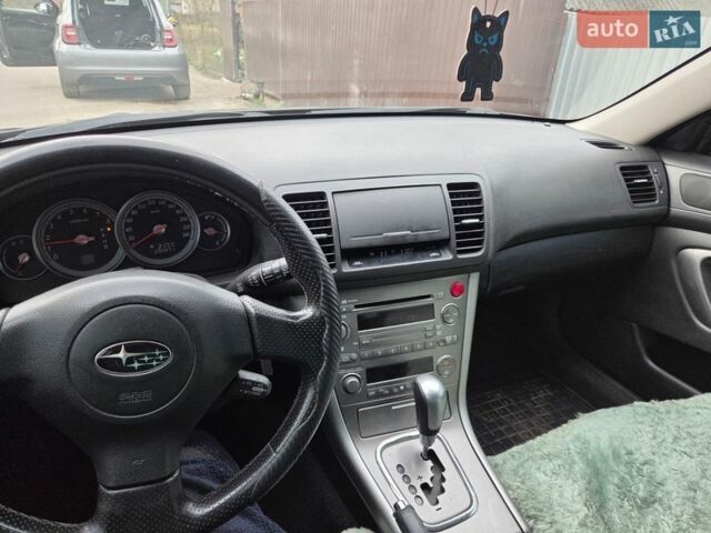 Черный Субару Легаси, объемом двигателя 2.46 л и пробегом 295 тыс. км за 6600 $, фото 6 на Automoto.ua