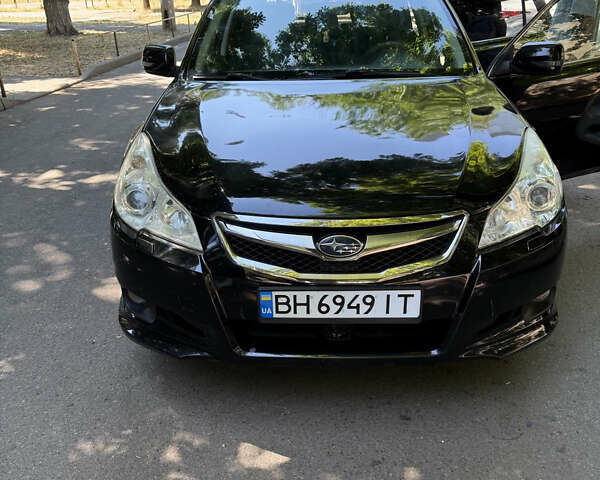 Черный Субару Легаси, объемом двигателя 1.99 л и пробегом 165 тыс. км за 6000 $, фото 1 на Automoto.ua