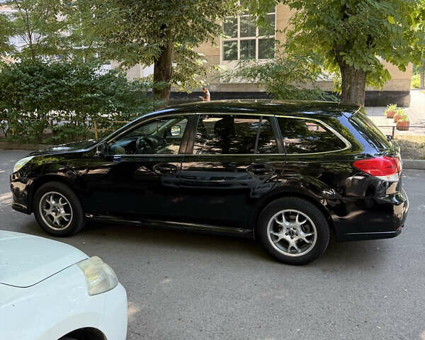 Черный Субару Легаси, объемом двигателя 1.99 л и пробегом 165 тыс. км за 6900 $, фото 4 на Automoto.ua