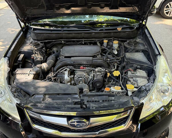 Черный Субару Легаси, объемом двигателя 1.99 л и пробегом 165 тыс. км за 6900 $, фото 7 на Automoto.ua