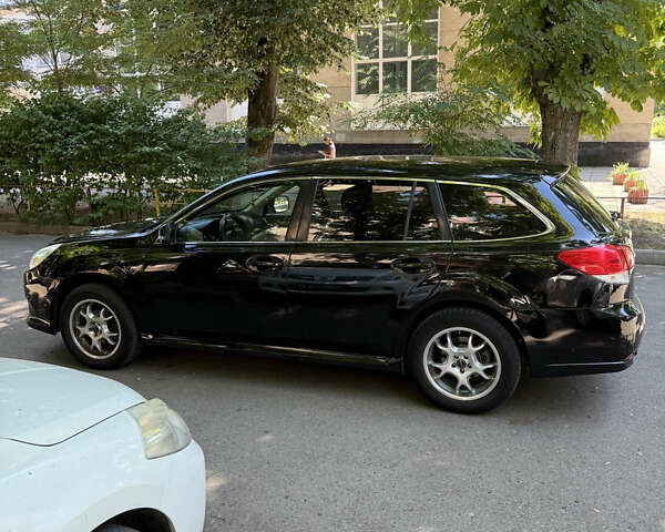 Черный Субару Легаси, объемом двигателя 1.99 л и пробегом 165 тыс. км за 6900 $, фото 5 на Automoto.ua