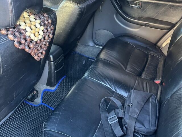 Фіолетовий Субару Легасі, об'ємом двигуна 2 л та пробігом 367 тис. км за 2000 $, фото 4 на Automoto.ua