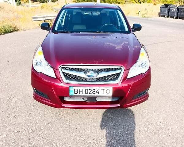 Червоний Субару Легасі, об'ємом двигуна 2.46 л та пробігом 81 тис. км за 7600 $, фото 1 на Automoto.ua