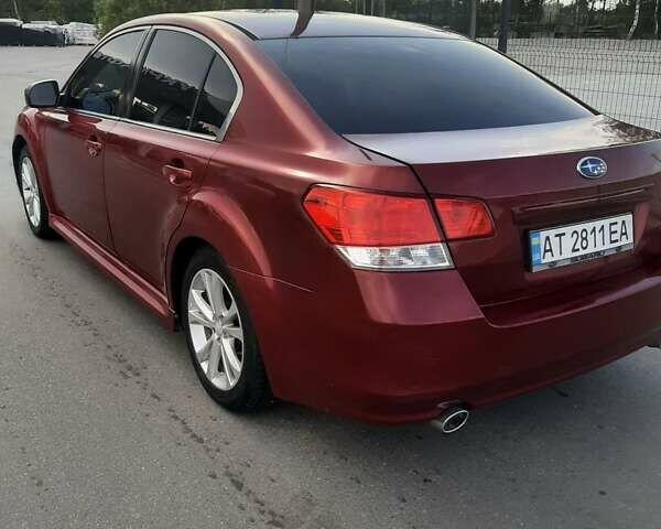 Красный Субару Легаси, объемом двигателя 2.5 л и пробегом 175 тыс. км за 7600 $, фото 5 на Automoto.ua