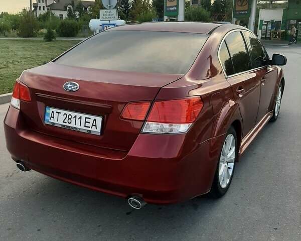 Красный Субару Легаси, объемом двигателя 2.5 л и пробегом 175 тыс. км за 7600 $, фото 2 на Automoto.ua