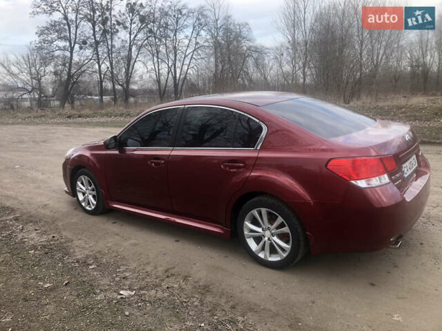 Красный Субару Легаси, объемом двигателя 2.5 л и пробегом 180 тыс. км за 9100 $, фото 2 на Automoto.ua