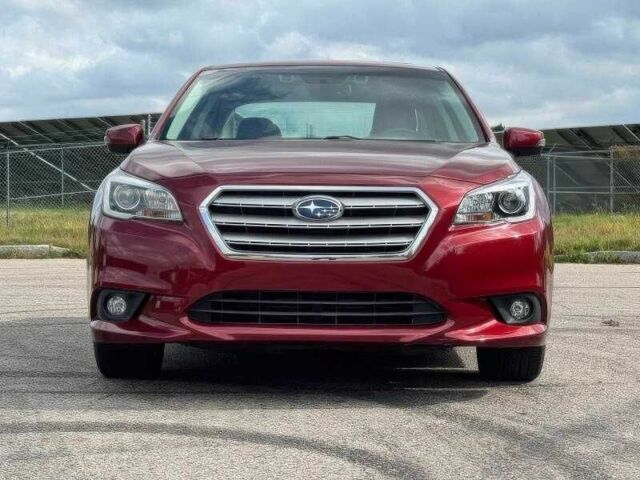 Красный Субару Легаси, объемом двигателя 2.5 л и пробегом 88 тыс. км за 9000 $, фото 1 на Automoto.ua