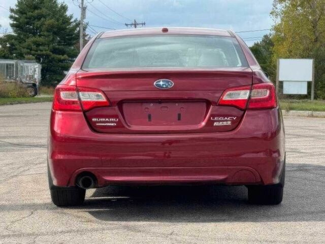 Красный Субару Легаси, объемом двигателя 2.5 л и пробегом 88 тыс. км за 9000 $, фото 6 на Automoto.ua