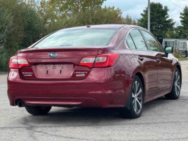 Красный Субару Легаси, объемом двигателя 2.5 л и пробегом 88 тыс. км за 9000 $, фото 5 на Automoto.ua