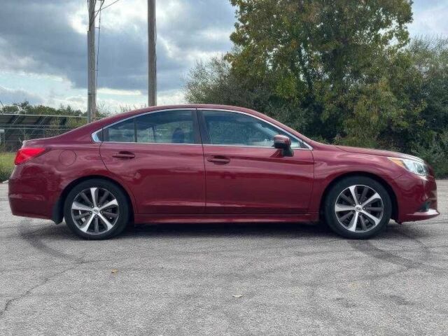 Красный Субару Легаси, объемом двигателя 2.5 л и пробегом 88 тыс. км за 9000 $, фото 4 на Automoto.ua