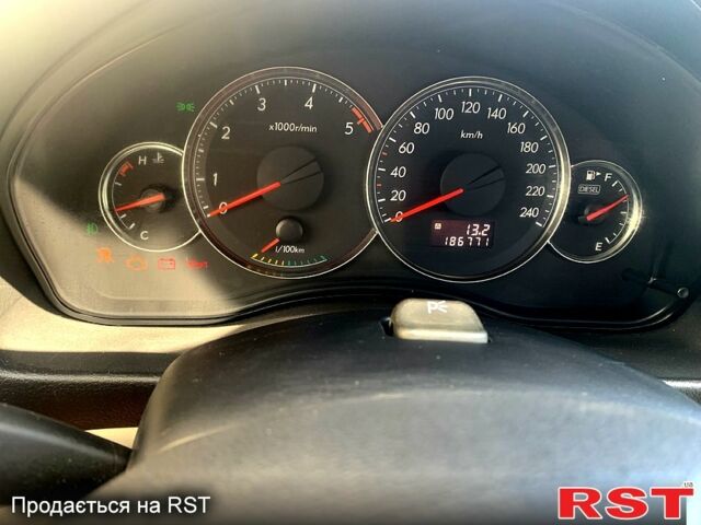 Красный Субару Легаси, объемом двигателя 2 л и пробегом 188 тыс. км за 5500 $, фото 2 на Automoto.ua