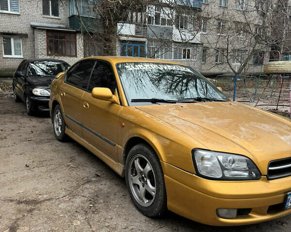 Желтый Субару Легаси, объемом двигателя 2.46 л и пробегом 345 тыс. км за 4100 $, фото 3 на Automoto.ua