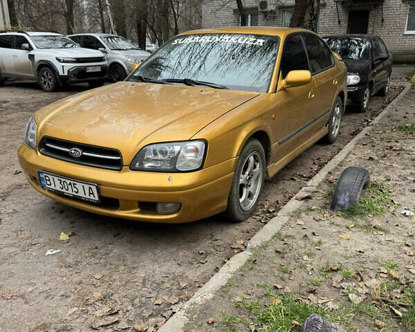 Желтый Субару Легаси, объемом двигателя 2.46 л и пробегом 345 тыс. км за 4100 $, фото 9 на Automoto.ua