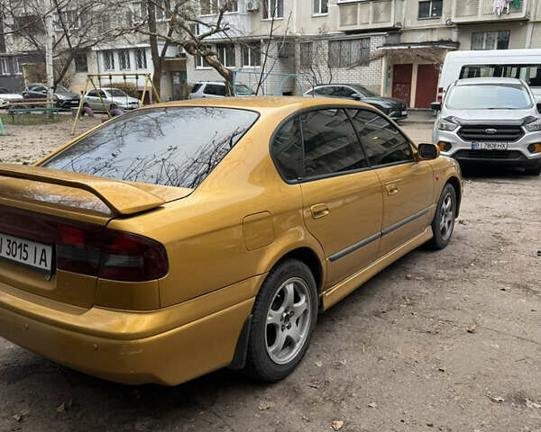 Желтый Субару Легаси, объемом двигателя 2.46 л и пробегом 345 тыс. км за 4100 $, фото 5 на Automoto.ua
