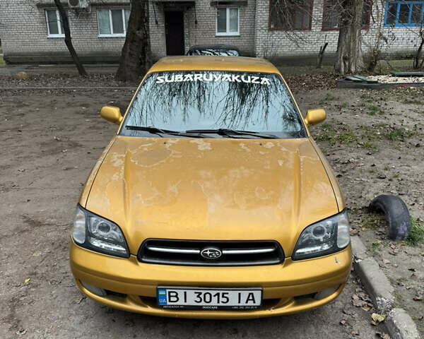Желтый Субару Легаси, объемом двигателя 2.46 л и пробегом 345 тыс. км за 4100 $, фото 1 на Automoto.ua