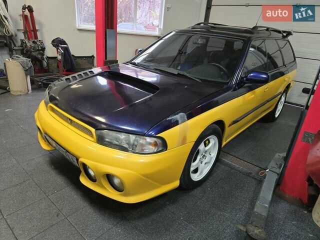 Жовтий Субару Легасі, об'ємом двигуна 2.46 л та пробігом 137 тис. км за 3300 $, фото 1 на Automoto.ua