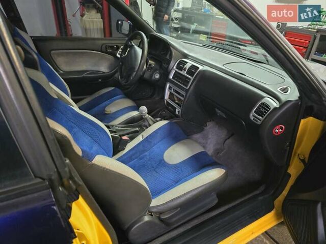 Жовтий Субару Легасі, об'ємом двигуна 2.46 л та пробігом 137 тис. км за 3300 $, фото 6 на Automoto.ua
