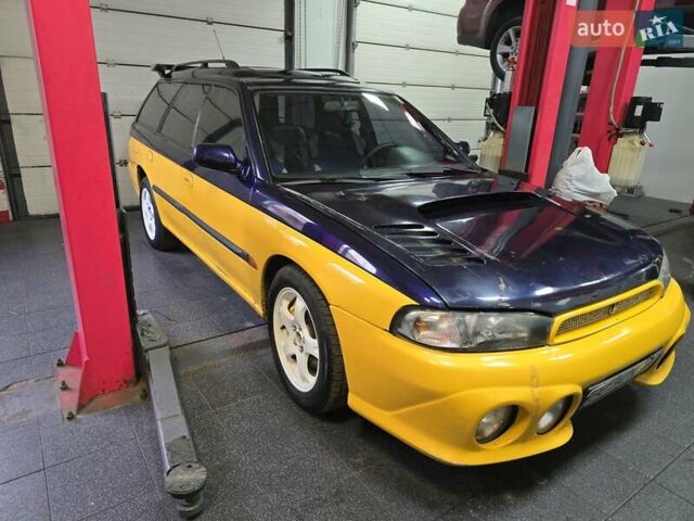 Жовтий Субару Легасі, об'ємом двигуна 2.46 л та пробігом 137 тис. км за 3300 $, фото 2 на Automoto.ua