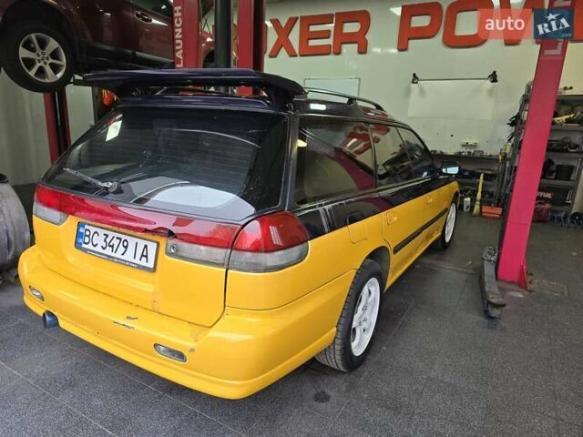 Жовтий Субару Легасі, об'ємом двигуна 2.46 л та пробігом 137 тис. км за 3300 $, фото 3 на Automoto.ua