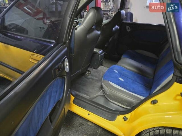 Жовтий Субару Легасі, об'ємом двигуна 2.46 л та пробігом 137 тис. км за 3300 $, фото 7 на Automoto.ua