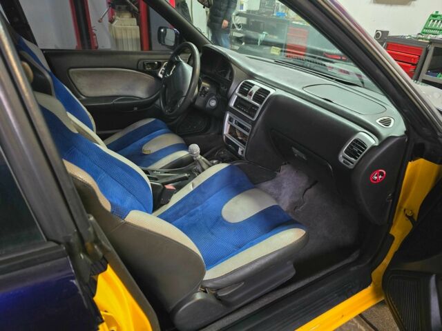 Жовтий Субару Легасі, об'ємом двигуна 2.5 л та пробігом 137 тис. км за 3300 $, фото 6 на Automoto.ua