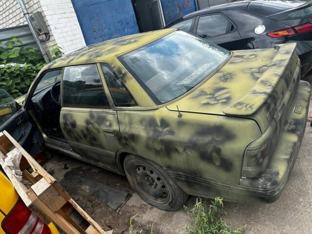 Сірий Субару Легасі, об'ємом двигуна 2 л та пробігом 200 тис. км за 898 $, фото 2 на Automoto.ua