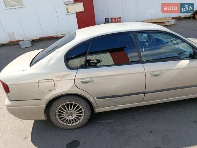 Сірий Субару Легасі, об'ємом двигуна 1.99 л та пробігом 394 тис. км за 2800 $, фото 4 на Automoto.ua