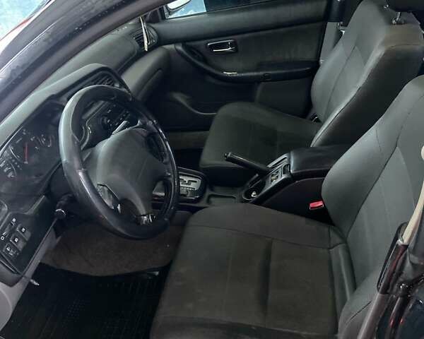 Сірий Субару Легасі, об'ємом двигуна 2 л та пробігом 270 тис. км за 3300 $, фото 4 на Automoto.ua