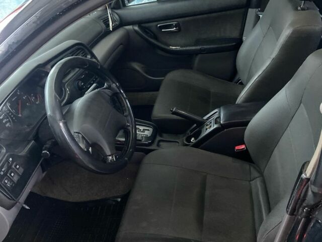 Сірий Субару Легасі, об'ємом двигуна 2 л та пробігом 300 тис. км за 3100 $, фото 4 на Automoto.ua