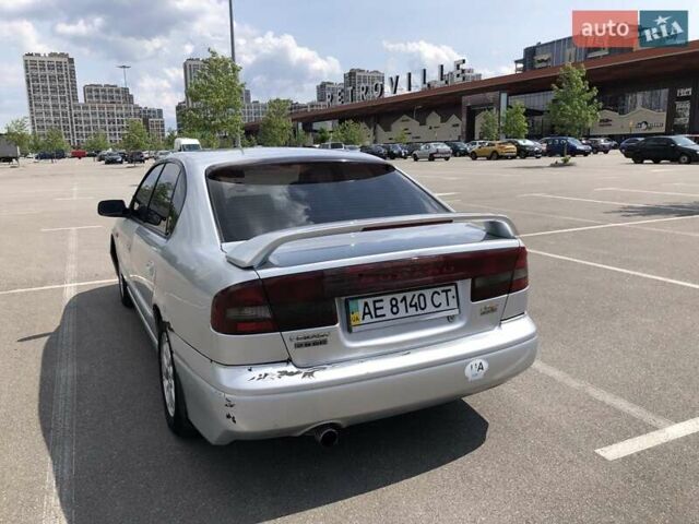 Сірий Субару Легасі, об'ємом двигуна 1.99 л та пробігом 251 тис. км за 2400 $, фото 3 на Automoto.ua