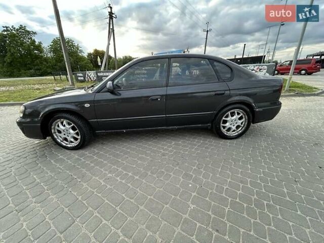 Сірий Субару Легасі, об'ємом двигуна 2 л та пробігом 400 тис. км за 3200 $, фото 3 на Automoto.ua