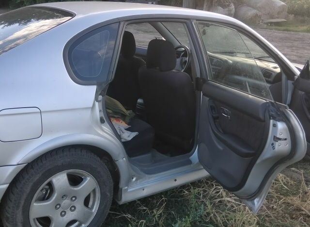 Сірий Субару Легасі, об'ємом двигуна 2 л та пробігом 300 тис. км за 3000 $, фото 3 на Automoto.ua