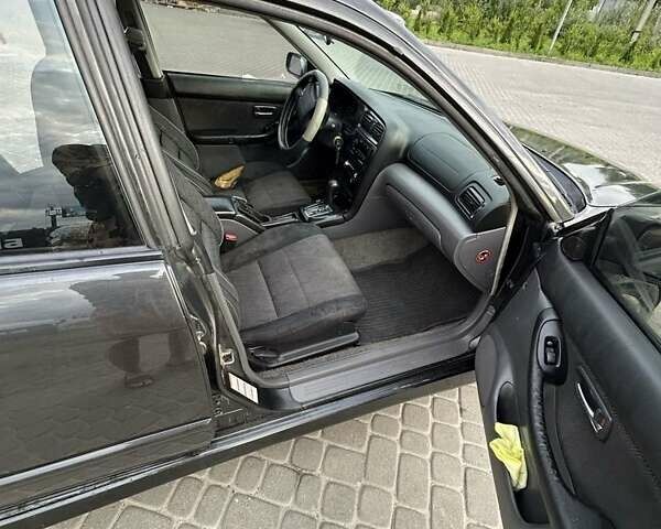 Сірий Субару Легасі, об'ємом двигуна 2 л та пробігом 400 тис. км за 3200 $, фото 9 на Automoto.ua