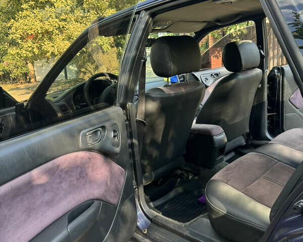 Синій Субару Легасі, об'ємом двигуна 2 л та пробігом 350 тис. км за 1850 $, фото 2 на Automoto.ua