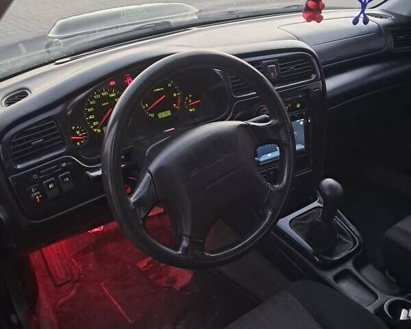 Синій Субару Легасі, об'ємом двигуна 2 л та пробігом 320 тис. км за 2800 $, фото 1 на Automoto.ua