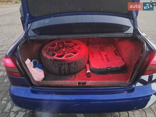 Синій Субару Легасі, об'ємом двигуна 2 л та пробігом 320 тис. км за 2800 $, фото 4 на Automoto.ua