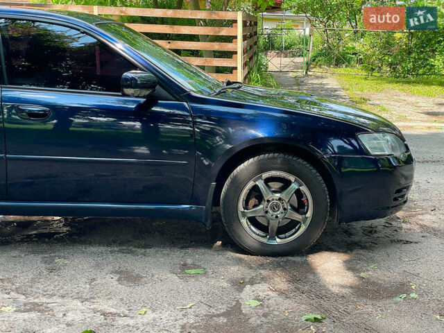 Синій Субару Легасі, об'ємом двигуна 2 л та пробігом 318 тис. км за 5990 $, фото 6 на Automoto.ua