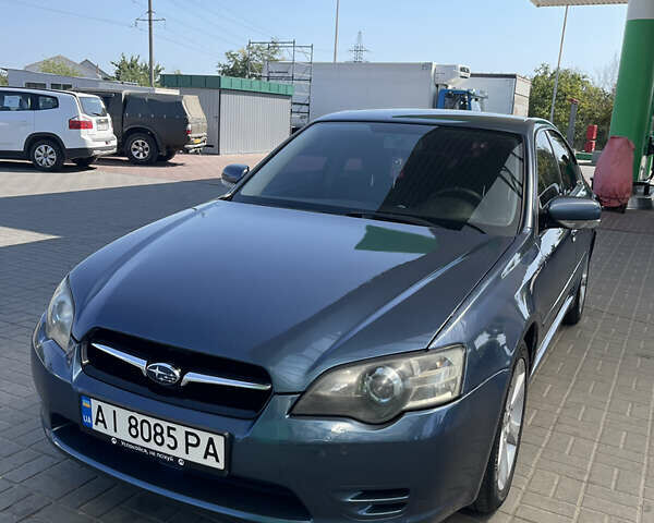 Синий Субару Легаси, объемом двигателя 2.5 л и пробегом 312 тыс. км за 6000 $, фото 1 на Automoto.ua