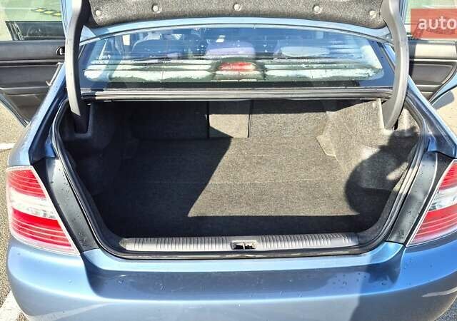 Синий Субару Легаси, объемом двигателя 2 л и пробегом 242 тыс. км за 6500 $, фото 2 на Automoto.ua