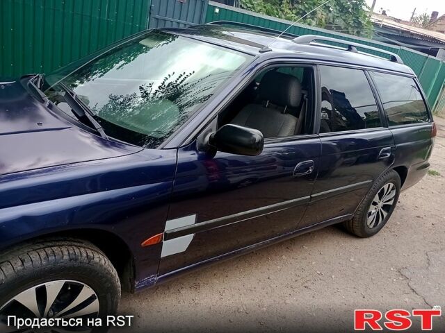 Синий Субару Легаси, объемом двигателя 2 л и пробегом 335 тыс. км за 2550 $, фото 4 на Automoto.ua