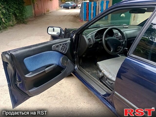 Синий Субару Легаси, объемом двигателя 2 л и пробегом 335 тыс. км за 2550 $, фото 1 на Automoto.ua