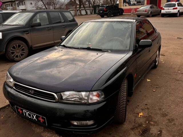 Зеленый Субару Легаси, объемом двигателя 2.5 л и пробегом 300 тыс. км за 2100 $, фото 2 на Automoto.ua