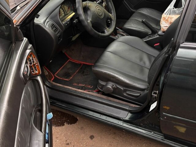 Зеленый Субару Легаси, объемом двигателя 2.5 л и пробегом 300 тыс. км за 2100 $, фото 4 на Automoto.ua