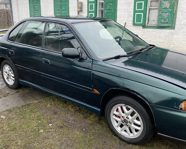 Зеленый Субару Легаси, объемом двигателя 2.46 л и пробегом 300 тыс. км за 1770 $, фото 4 на Automoto.ua