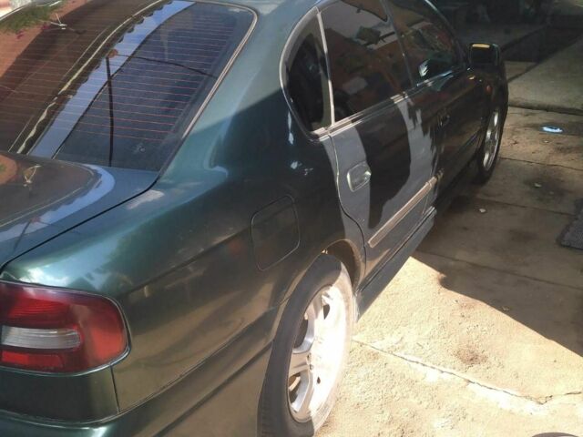 Зеленый Субару Легаси, объемом двигателя 2.5 л и пробегом 245 тыс. км за 3000 $, фото 8 на Automoto.ua