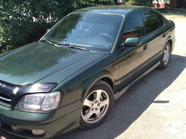 Зеленый Субару Легаси, объемом двигателя 2.5 л и пробегом 245 тыс. км за 3000 $, фото 5 на Automoto.ua