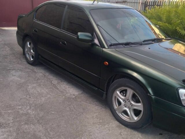 Зеленый Субару Легаси, объемом двигателя 2.5 л и пробегом 245 тыс. км за 3000 $, фото 3 на Automoto.ua