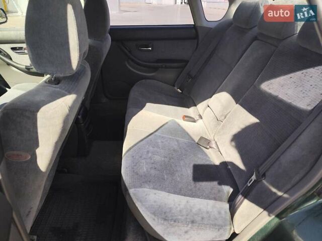 Зеленый Субару Легаси, объемом двигателя 1.99 л и пробегом 388 тыс. км за 2700 $, фото 6 на Automoto.ua