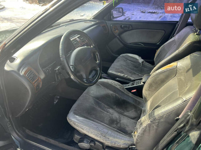 Зелений Субару Легасі, об'ємом двигуна 2.5 л та пробігом 369 тис. км за 1000 $, фото 9 на Automoto.ua