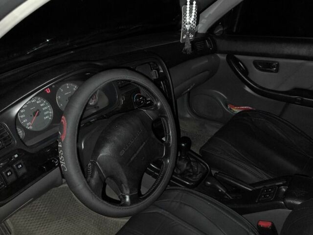 Зеленый Субару Легаси, объемом двигателя 2.5 л и пробегом 250 тыс. км за 2900 $, фото 6 на Automoto.ua